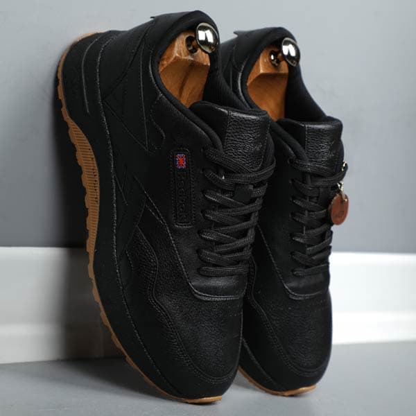 کتونی مردانه ریبوک آرام پا مشکی زیره کاراملی