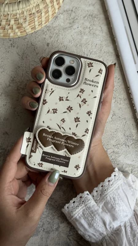 کاور آیفون گل چهارفصل فرگننت چرمی + استندقلبی