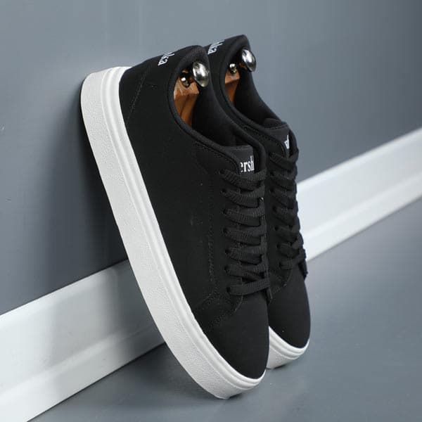 کتونی مردانه برشکا مشکی زیره سفید پونیک