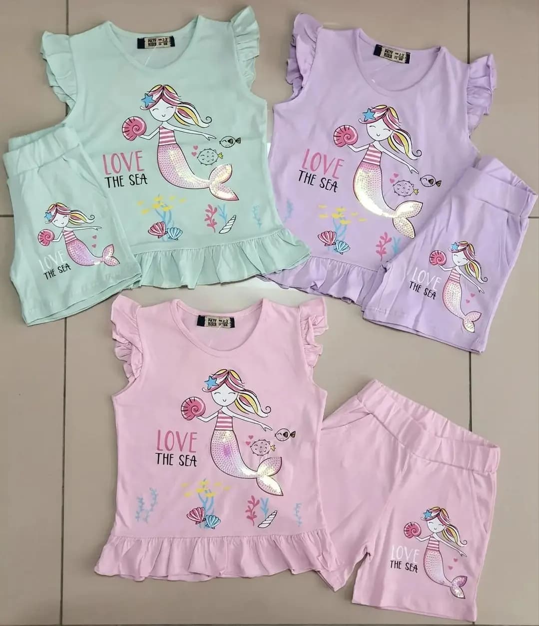 ست تاپ شلوارک دخترانه پولکدوزی طرح پری دریایی رنگ صورتی و سبز محصول ترکیه