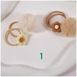 کش مو دخترانه پیکسل دار طرح گل