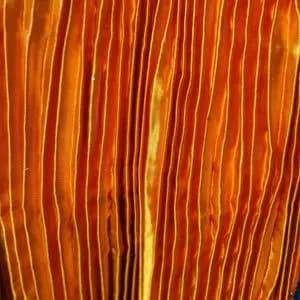 پارچه ساتن پلیسه رنگ نارنجی