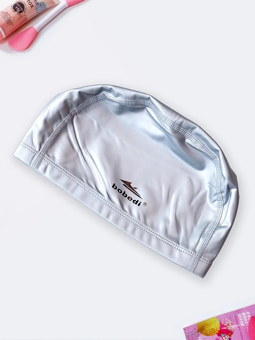 کلاه شنا طوسی زنانه و مردانه ضد کلر برند بوبدی ( bobedi ) با جنس فومی طرح ساده