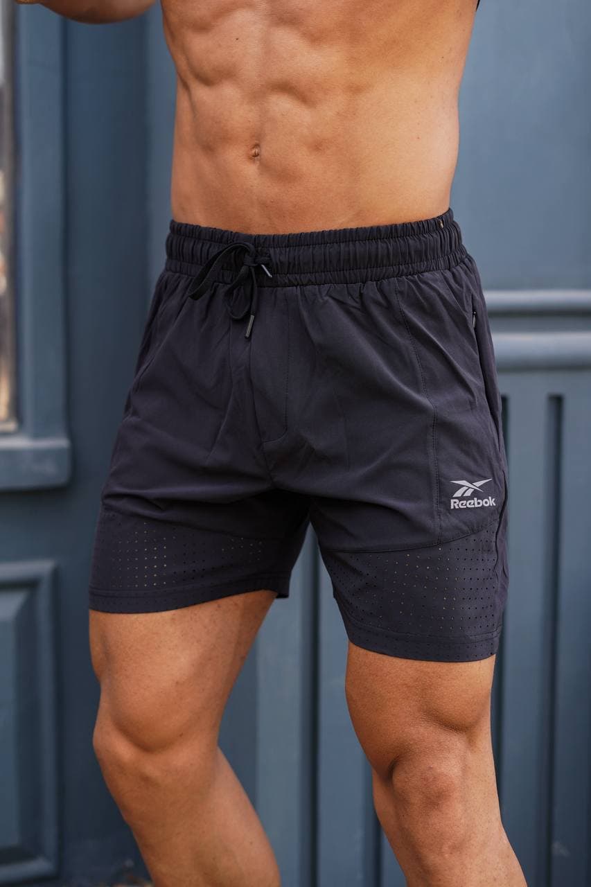 شلوارک ورزشی مردانه ریباک آیرو کد ۹۱۶۷