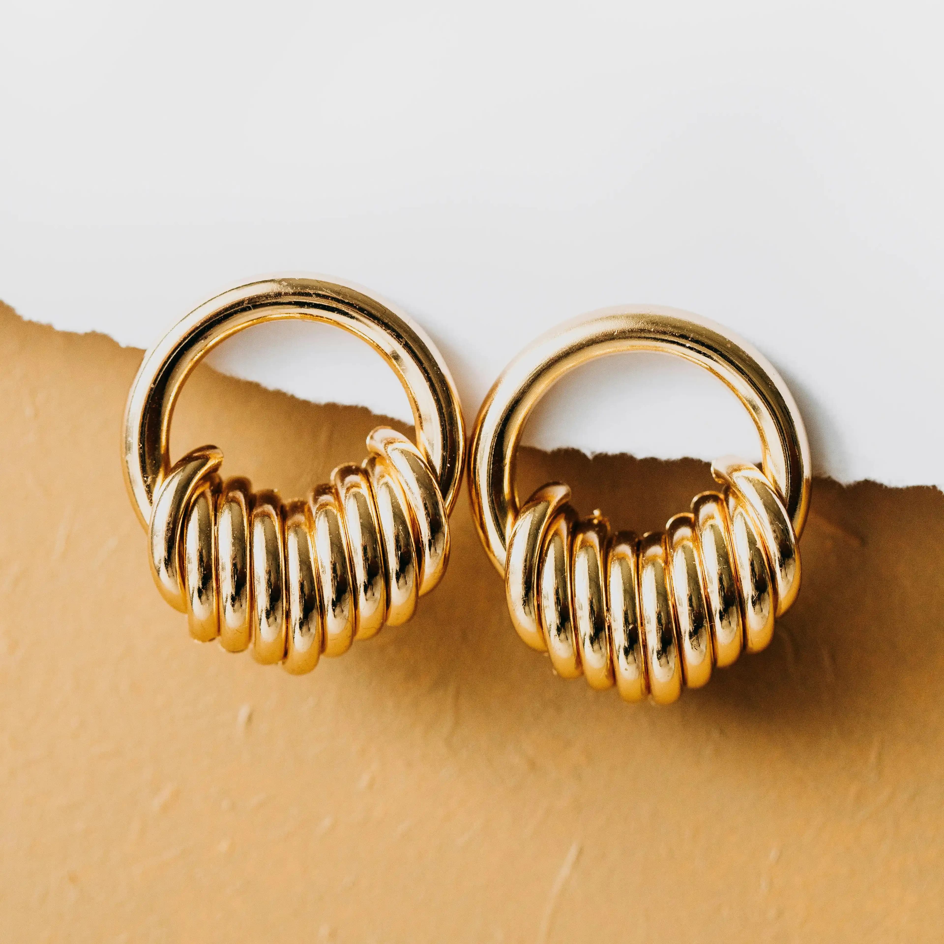 لوگوی فروشگاه مه گلد گالری