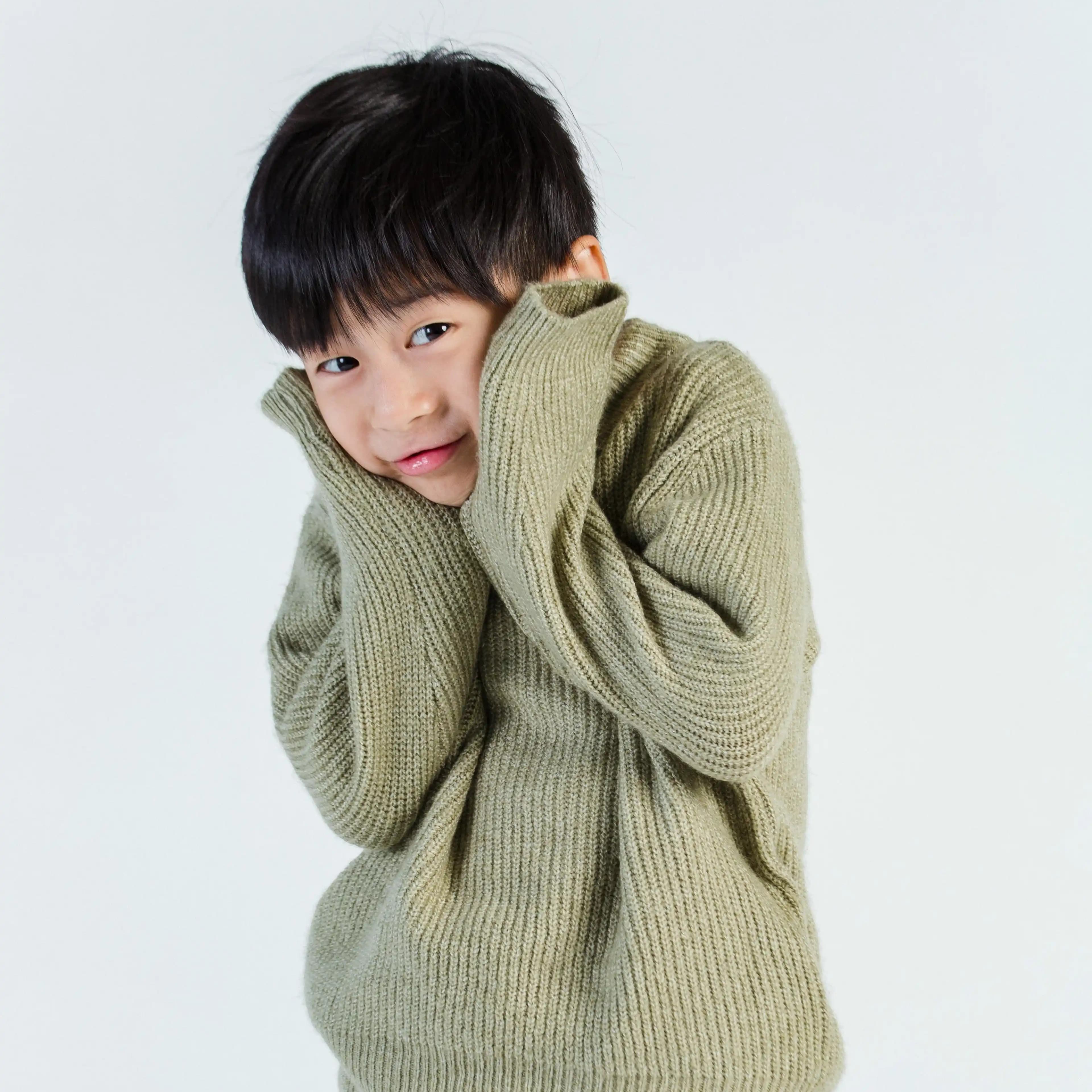 لوگوی فروشگاه پوشاک بچگانه کاورمو