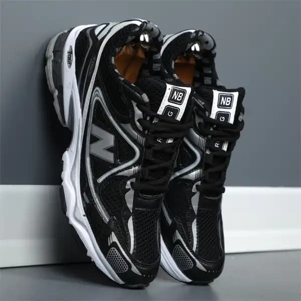 کتونی نیوبالانس 1064 مشکی سفید ITA