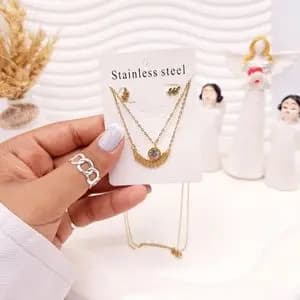 ست گوشواره و گردنبند دو لاین برگ و آویز نگین دار رنگ طلایی استیل