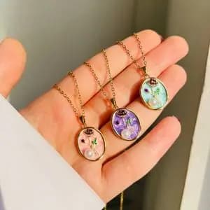 گردنبند استیل طرح مروارید و رز برجسته