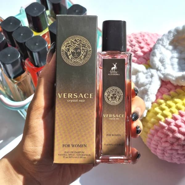 عطر الحمبرا رایحه VERSACE crystal noir