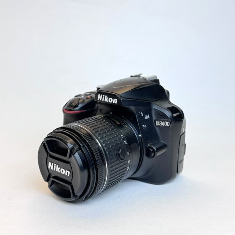 دوربین دست دوم دوربین دست دوم Nikon D3400 Kit 18-55mm f/3.5-5.6 G VR (22000 شات)