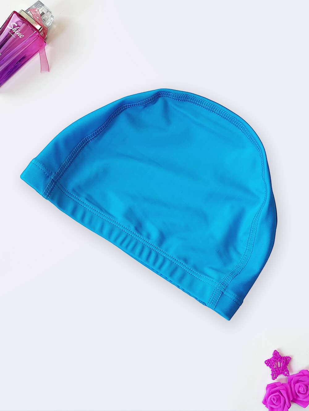 کلاه شنا به رنگ آبی با جنس پارچه ای ضد کلر با کیفیت بالا و قیمت ارزان