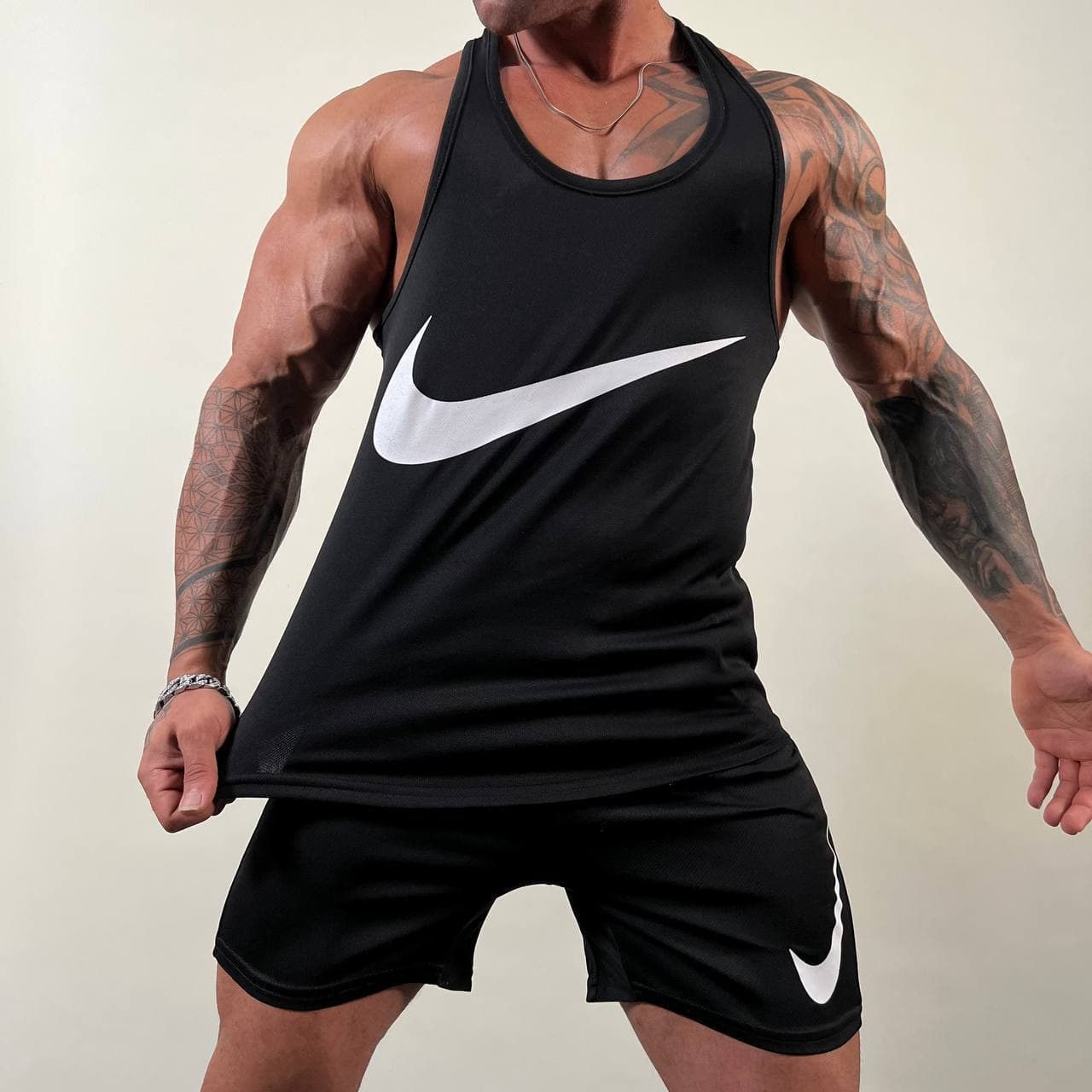 ست رکابی و شلوارک ورزشی مردانه نایک سوزنی کد ۲۸۵۵