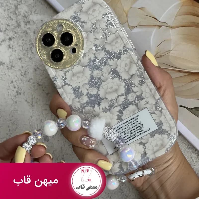 قاب موبایل آیفون گل مستر پیس سفید نقره ای + بندست مخملی - کد (۸۵۹۵۶)