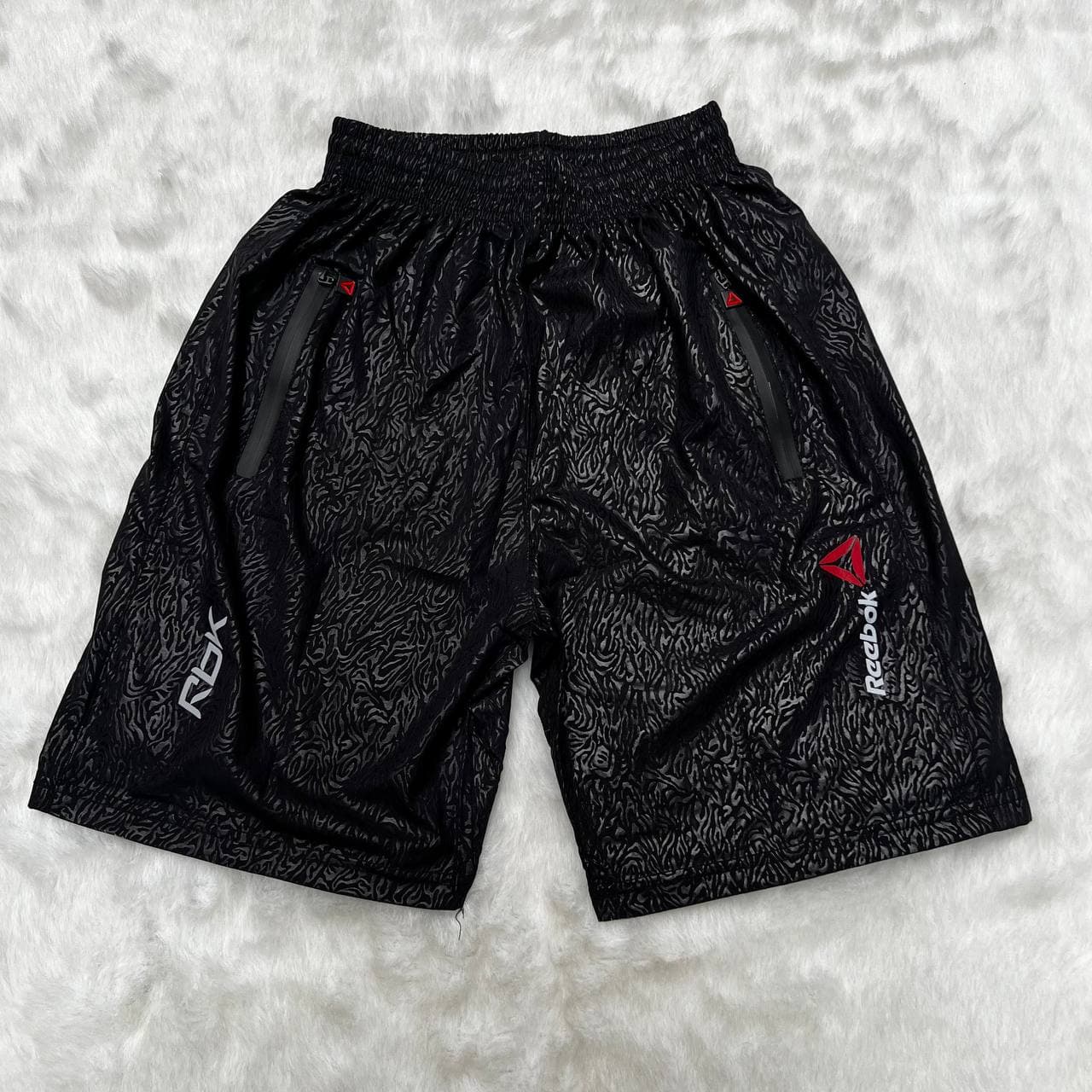 شلوارک ورزشی مردانه ریباک آیرو کد ۹۱۳۲