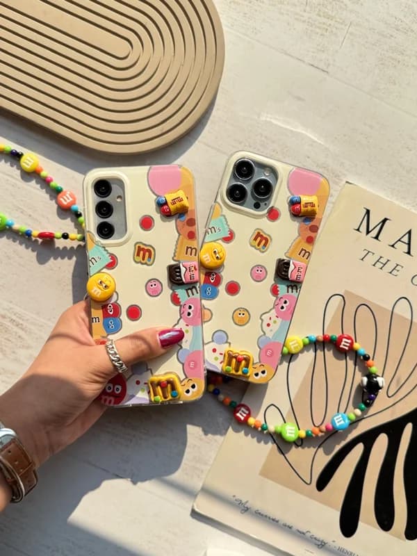 قاب گوشی آیفون M&M Land با آویز هدیه - کد (۶۰۸۳۴)