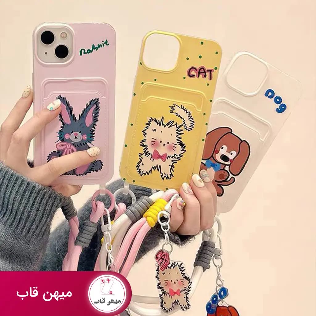 قاب گوشی آیفون عروسکی جاکارتی با بند دستی - کد (۲۶۵۲۱)