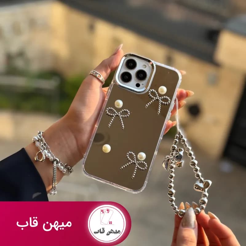 قاب گوشی آیفون آینه ای پاپیون مرواریدی با آویز - کد (۵۶۷۴۸)
