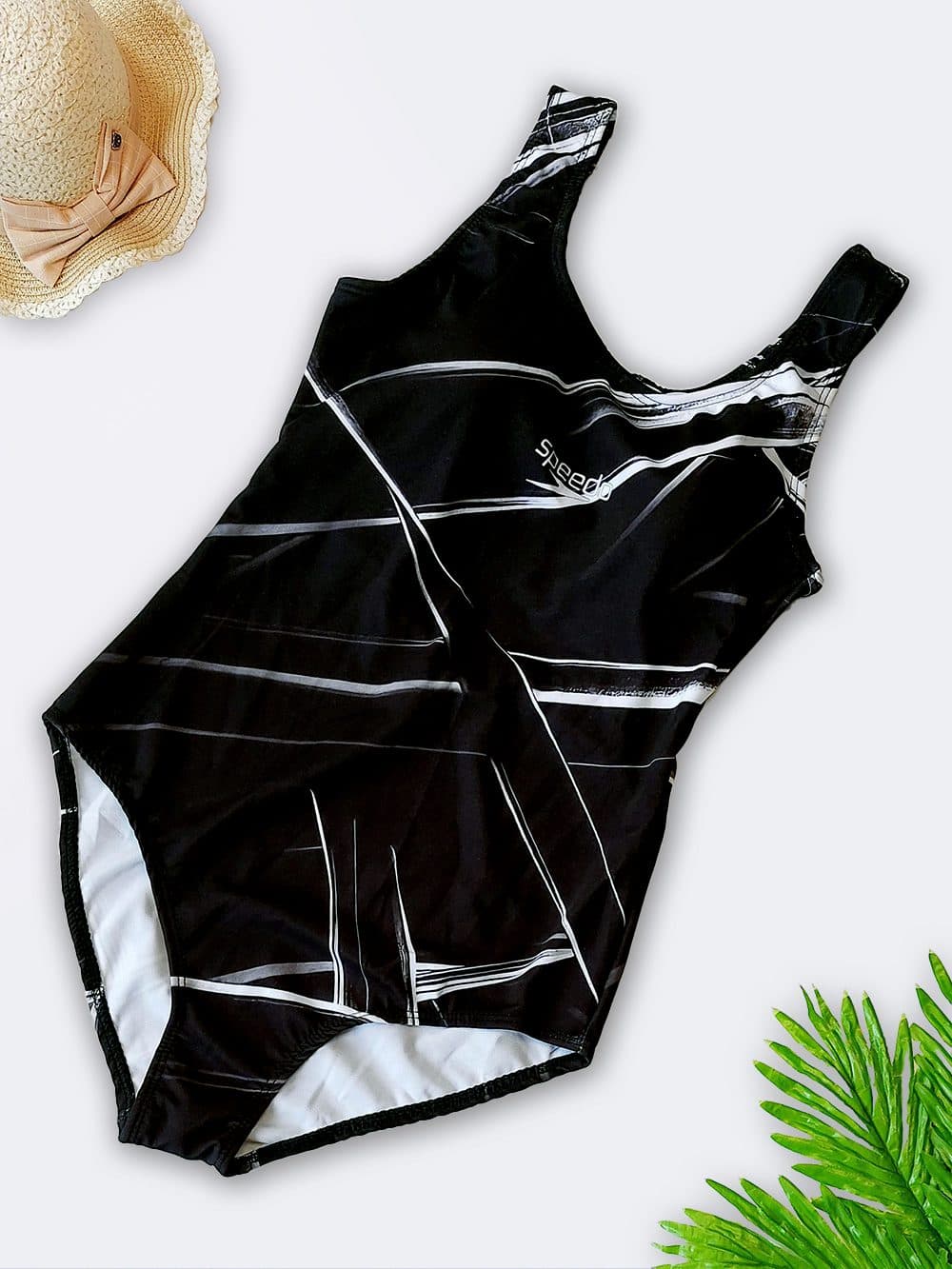 مایو اسلیپ زنانه مشکی رنگ کاپدار با بند پشت قهرمانی برای استخر برند اسپیدو ( Speedo ) طرحدار