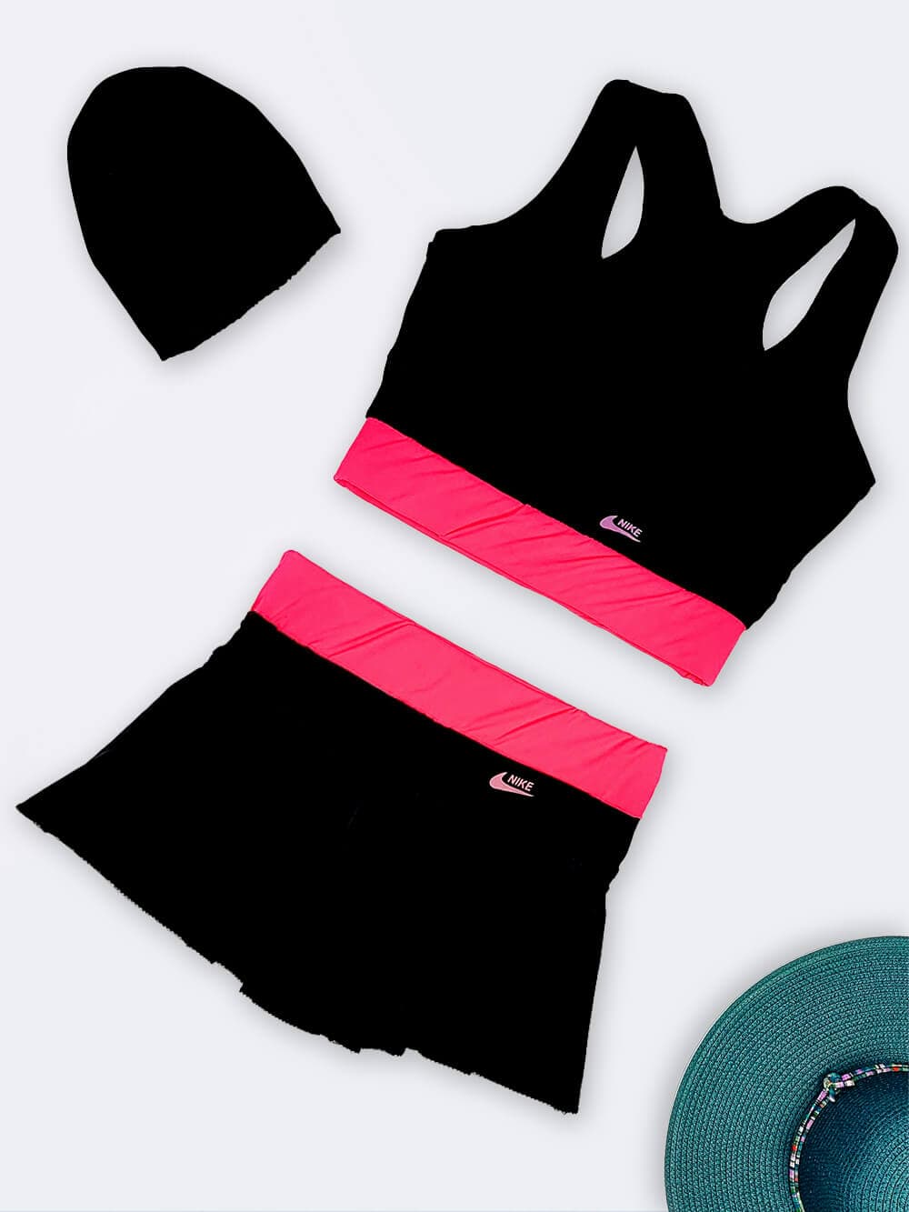 مایو دامنی دو تکه زنانه بصورت نیم تنه مایویی و دامن شورت دار مشکی و صورتی رنگ