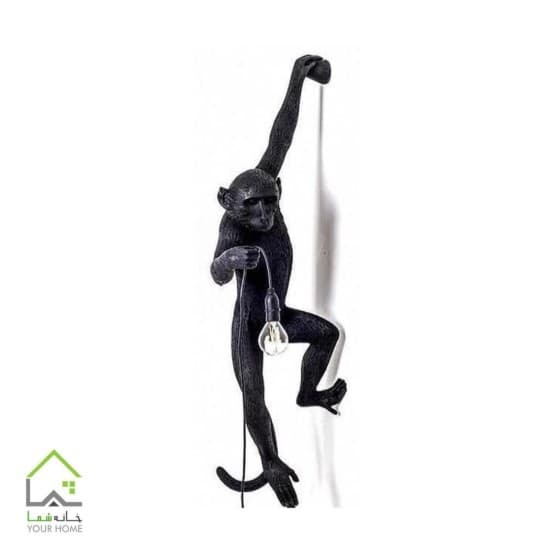مجسمه میمون بازیگوش دیواری