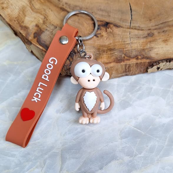 جاکلیدی سیلیکونی وارداتی طرح میمون بازیگوش همراه با بند آویز