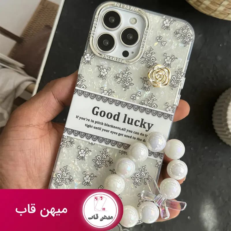 قاب گوشی آیفون گل شانس صدفی + بندست - کد (۴۸۱۸۵)