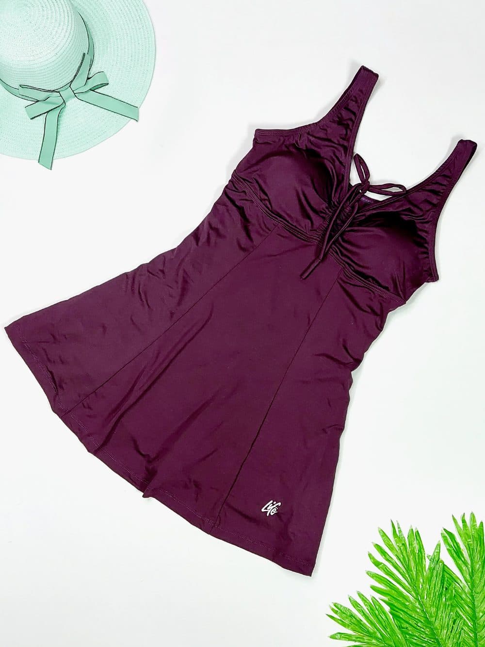 مایو دامنی زنانه کاپ دار بصورت شلوارک دار ( پادار ) لایف ( Life ) رنگ بادمجانی