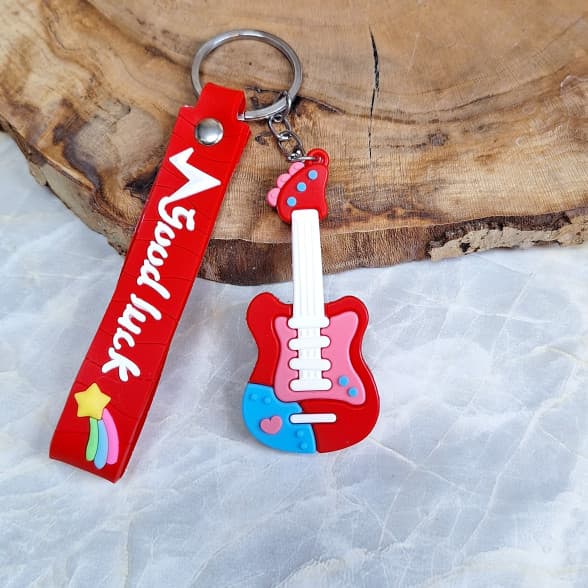 جاکلیدی سیلیکونی وارداتی طرح گیتار همراه با بند آویز