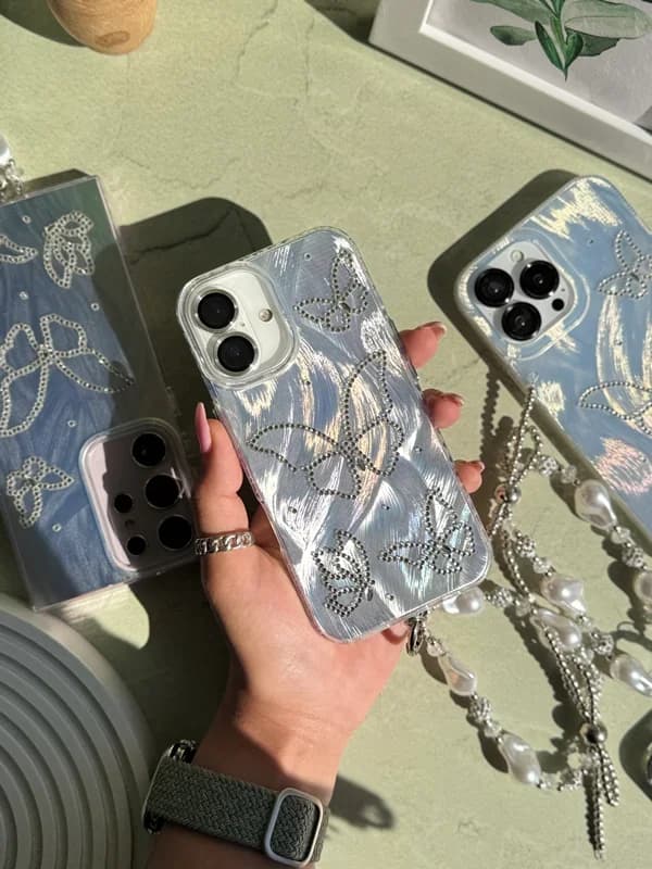 کاور گوشی آیفون پروانه نگینی با آویز