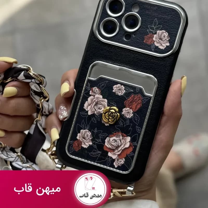 قاب موبایل آیفون گل رزا نرا جاکارتی دار + بندست اسکارف - کد (۱۰۱۳۵۵)