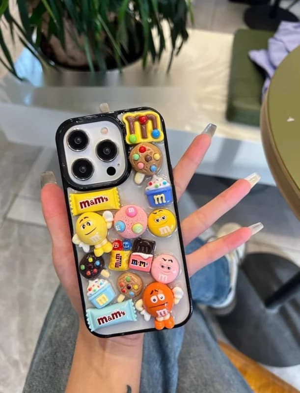 قاب گوشی آیفون M&M برجسته (بدون بند) - کد (۱۳۴۶۴)