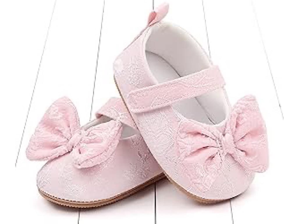 پاپوش صورتی رنگ استپ دار نوزادی دخترانه طرح پاپیون