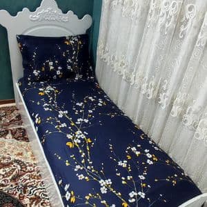 ملحفه دورتادور کشدوزی شده تشک تخت تک نفره طرح شکوفه سورمه ای